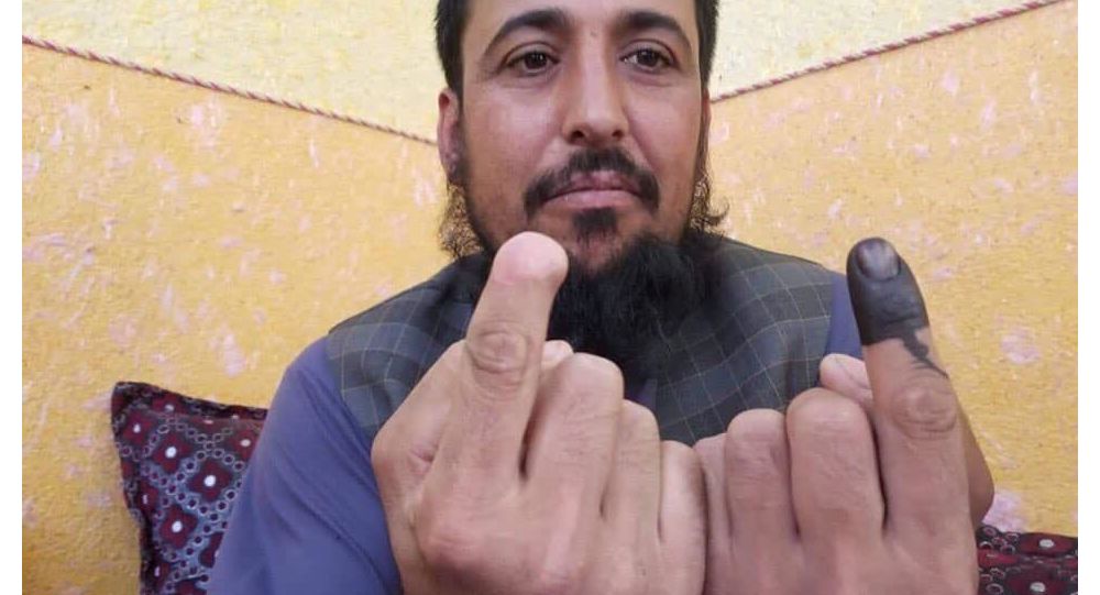 طالبان انگشتش را بریدند اما او رأی داد - تصویر دوم خبر